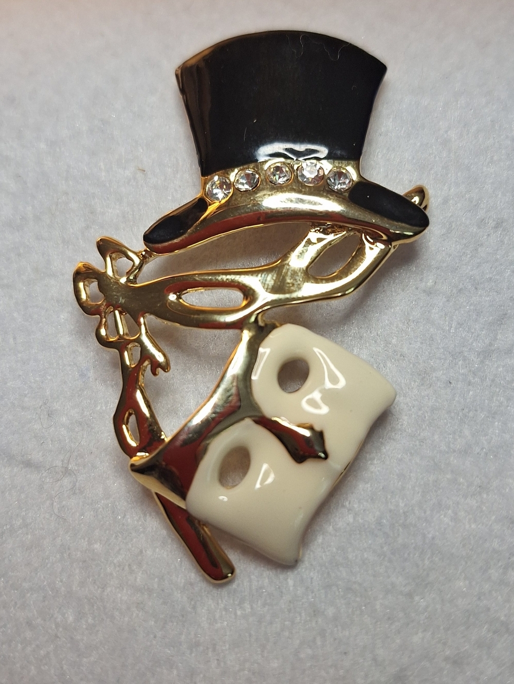 Gold Tone Masquerade Mask Brooch with Black and Cream Enamel